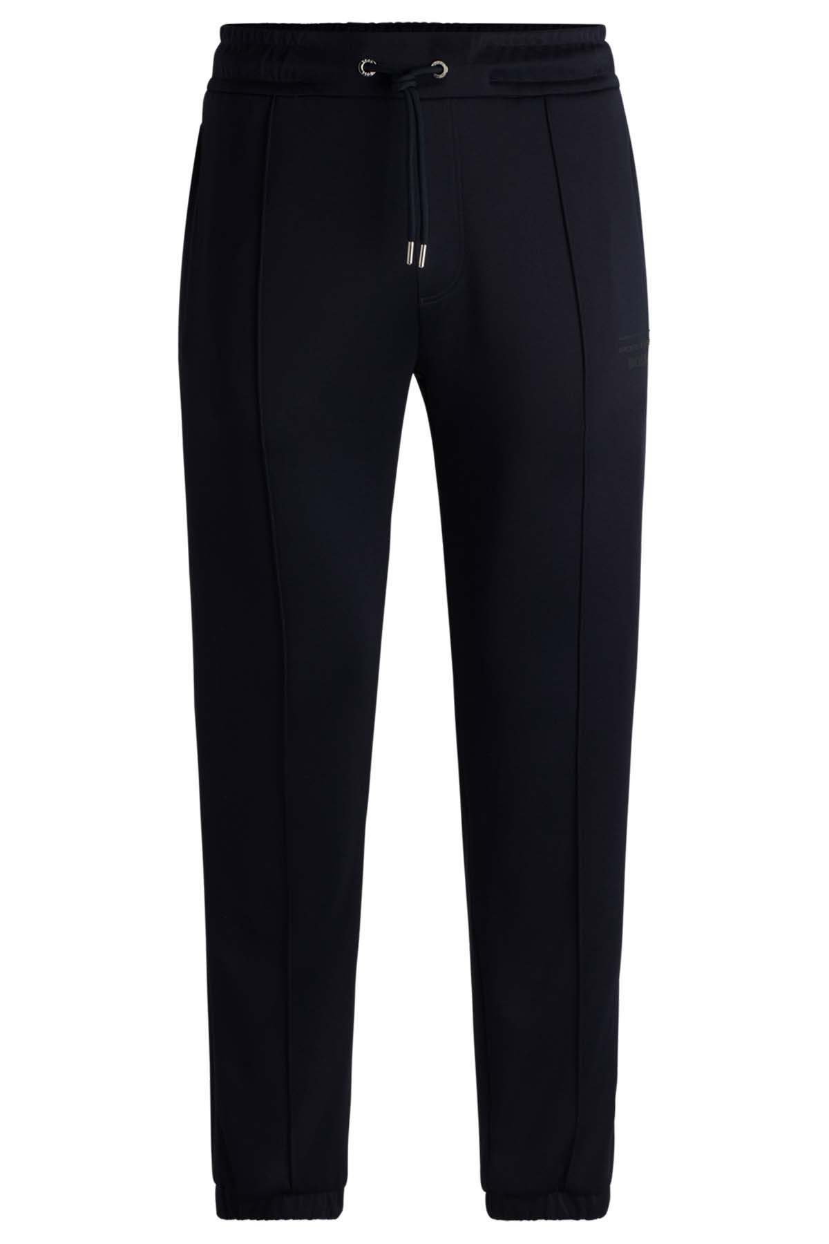 Pantalones slim fit de punto elástico técnico image number 4
